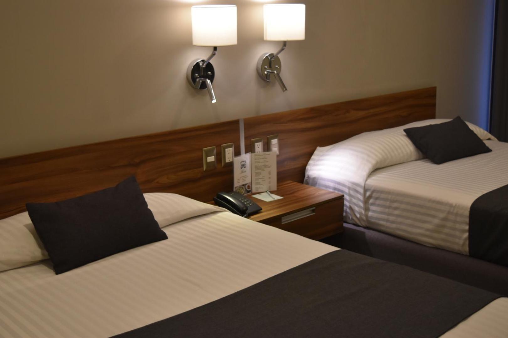 Estanza Hotel & Suites Morelia Quarto foto